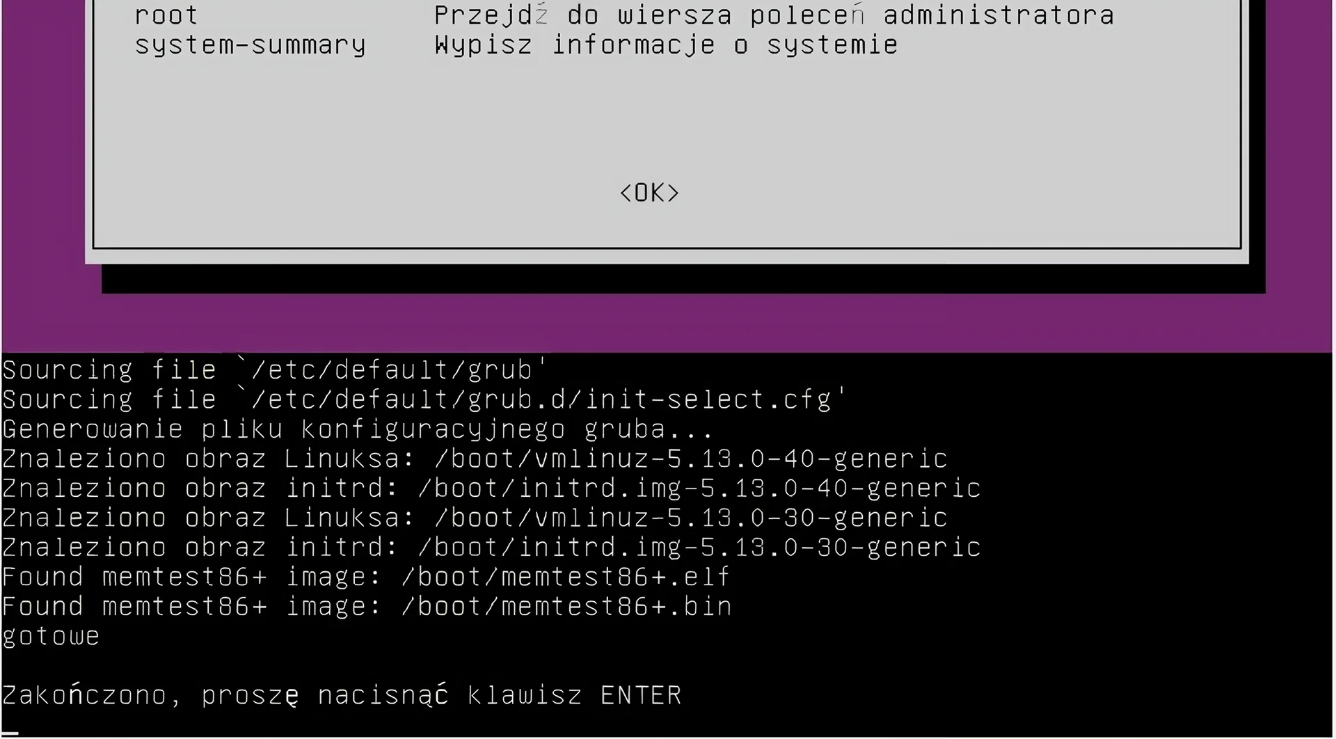 Ilustracja przedstawia fragment okna terminala w systemie Linux Ubuntu. Następuje proces aktualizacji programu rozruchowego GRUB. Na dole została wypisana informacja: Zakończono, proszę nacisnąć klawisz ENTER.