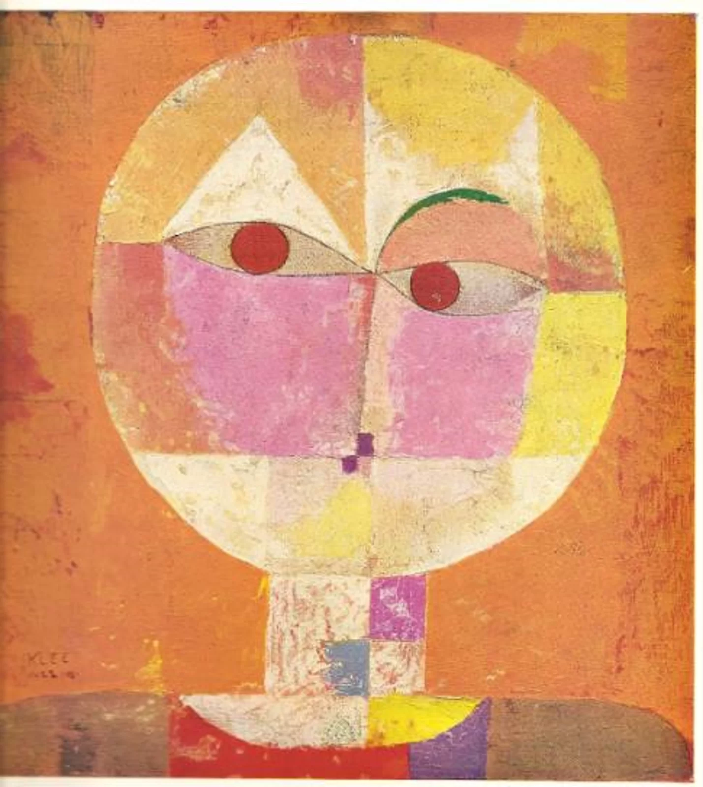 Ilustracja przedstawia obraz olejny „Senecio”, autorstwa Paul Klee. W namalowanej przez artystę kompozycji miesza się abstrakcja z malarstwem figuratywnym – jest to charakterystyczne dla jego twórczości. Płótno pokryte jest geometrycznymi kształtami stworzonymi z luźno malowanych płaszczyzn, które układają się w uproszczony portret człowieka o wielkiej, okrągłej głowie i szerokich ramionach. Oczy stanowią dwa czerwone kółka wpisane w łukowate, podłużne kształty. Twarz podzielona jest na płaskie  płaszczyzny barwne w kolorach różu, oranżowej czerwieni, pomarańczu, żółci i ciepłej bieli. Lewe, namalowane niżej oko wieńczy zielony łuk, natomiast nad prawym został namalowany biały trójkąt. W okolicy nosa znajdują się dwa małe fioletowe prostokąciki. Jasny prostokąt pod okręgiem głowy stanowi szyję. Ramiona stworzone zostały z wąskiego, poziomego, brązowego pasa umieszczonego na dole kompozycji, pośrodku którego znajduje się podzielona na mniejsze, kolorowe fragmenty płaszczyzna. Zgeometryzowana postać została umieszczona na ciepłym, malowanym przecierkowo, pomarańczowo‑czerwonym tle. W obrazie tym widoczne jest odwołanie do dziecięcej kreatywności, stanowiącej ważną inspirację w twórczości Paula Klee. Całość kompozycji utrzymana jest w ciepłej tonacji barw z dominantą oranżów.