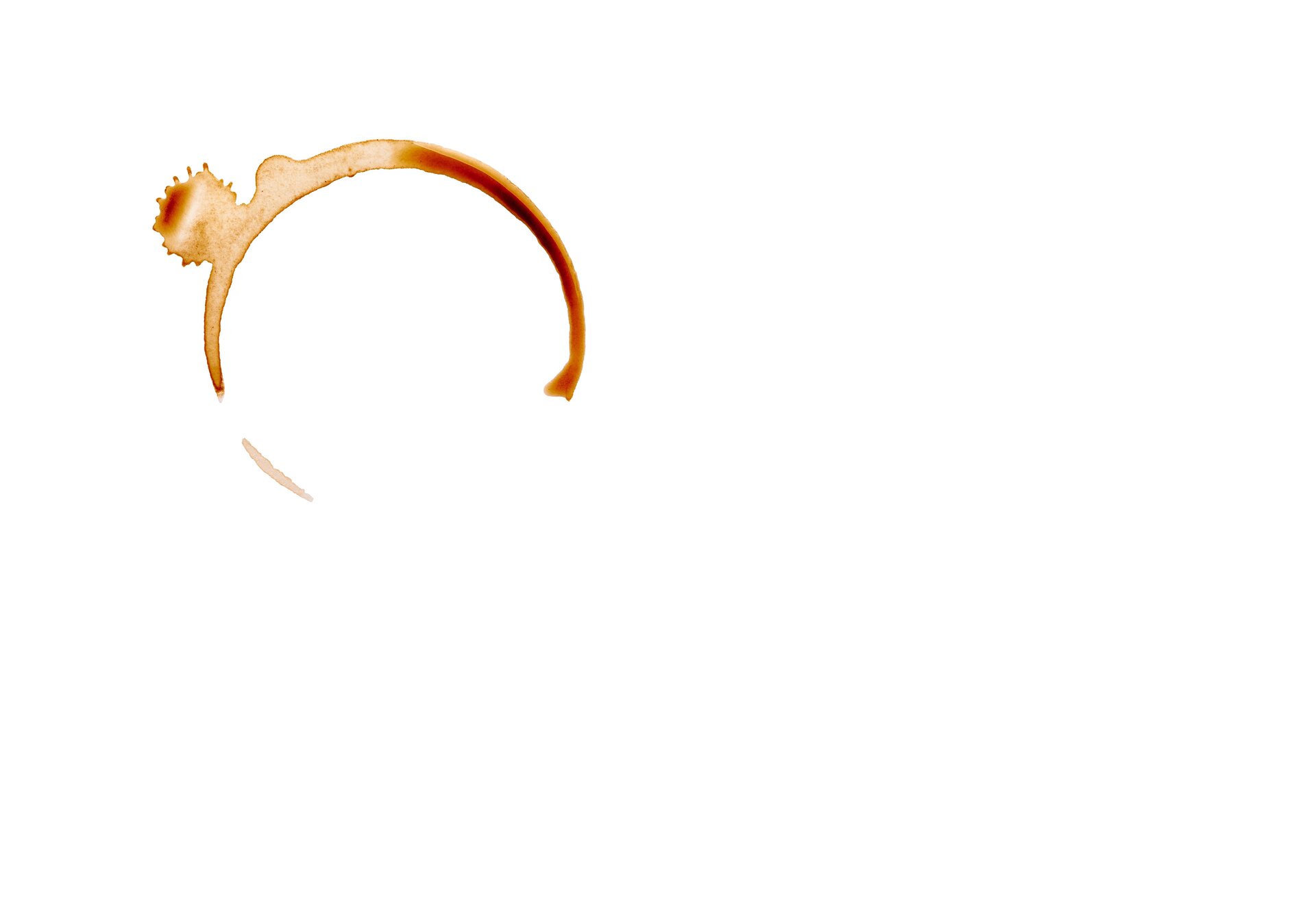 Zdjęcie ukazuje ślad po rozlanej kawie, powstałej w wyniku odciśnięcia spodu filiżanki. Jest okręgiem o nierównej grubości z plamą w górnej części.