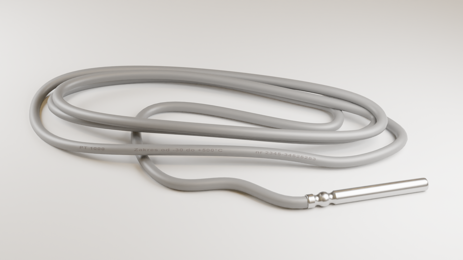 Zdjęcie przedstawia czujnik temperatury. To metalowy pręt podłączony do długiego przewodu. 
