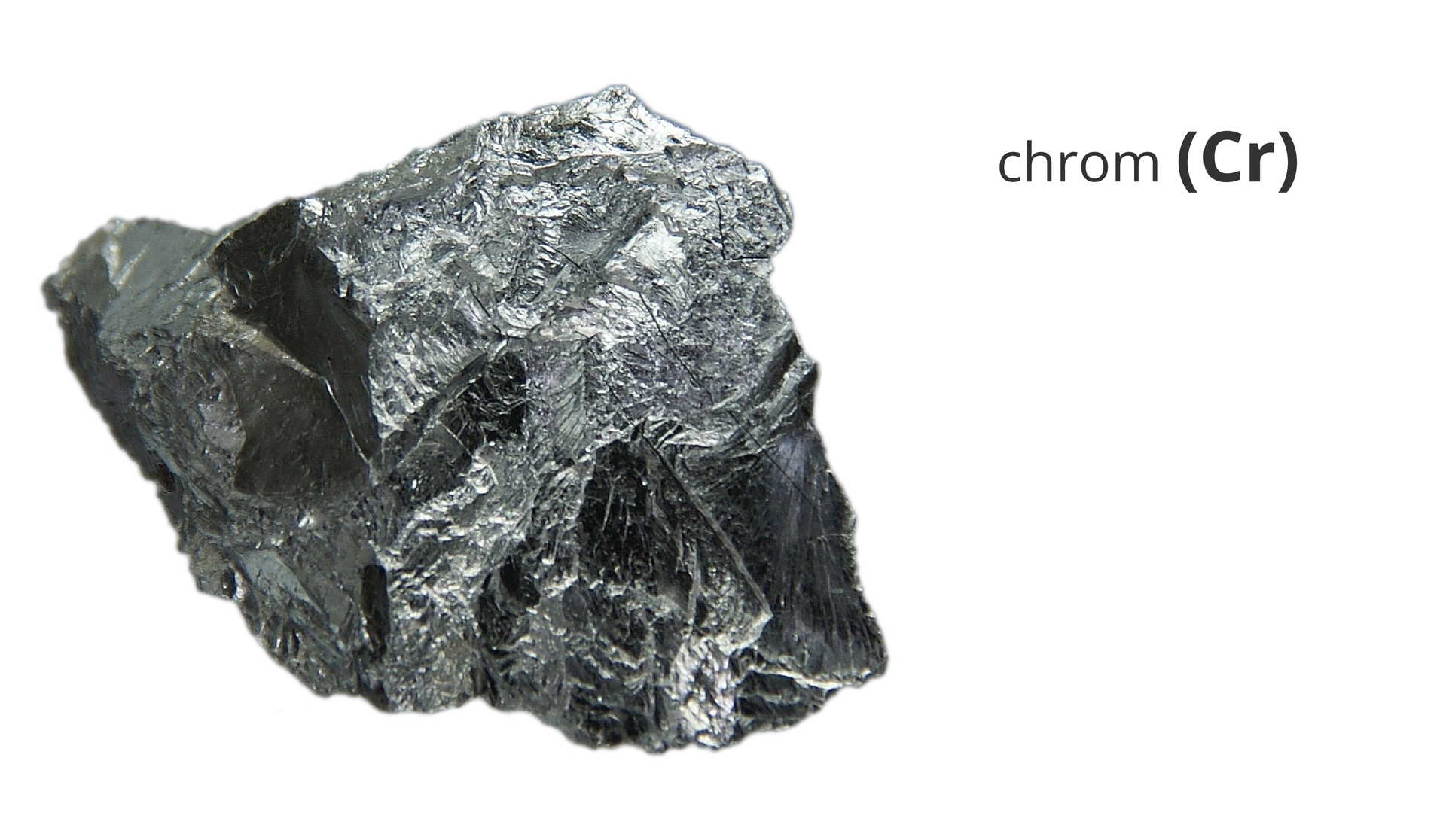 Zdjęcie przedstawia kawałek metalicznego chromu. Obok widnieje napis chrom i jego symbol Cr.