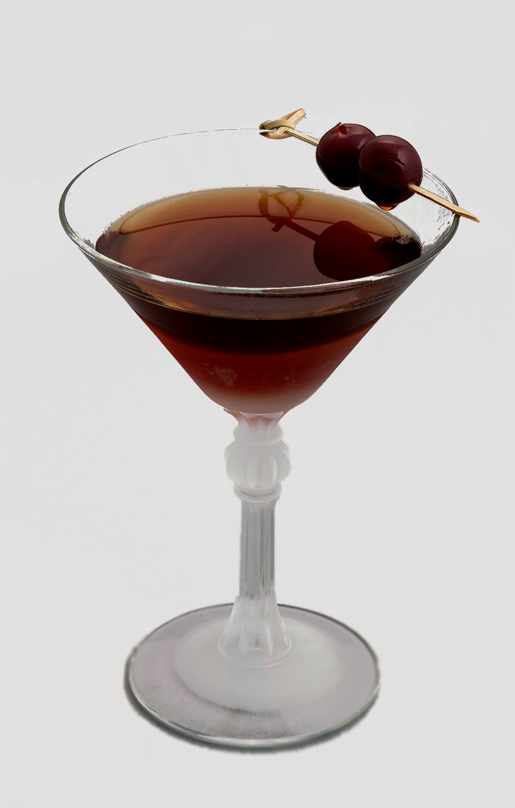 Zdjęcie przedstawia drink Rob Roy. Pod punktami interaktywnymi znajdują się nagrania audio prezentujące opis każdego drinka.