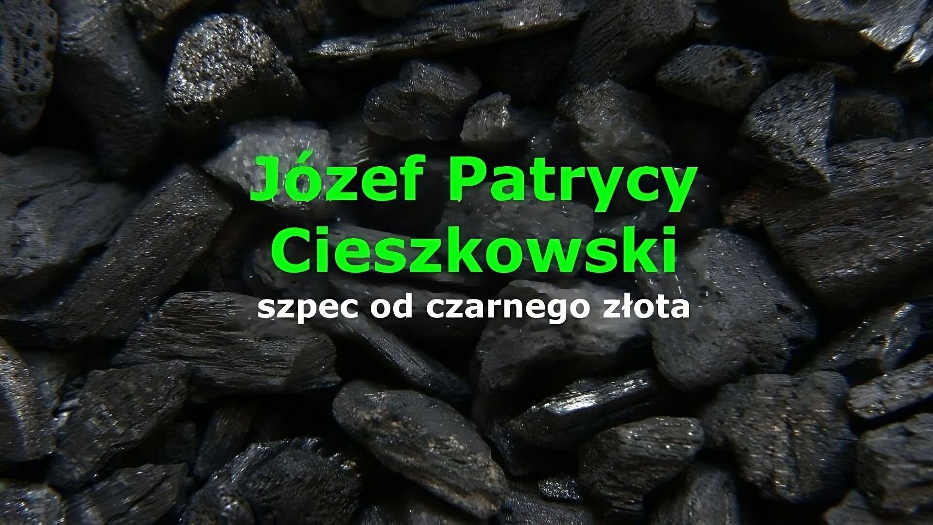 Slajd zawiera napis tytułowy umieszczony po środku: Józef Patrycy Cieszkowski, szpec od czarnego złota. Tłem slajdu jest zdjęcie bryłek węgla.