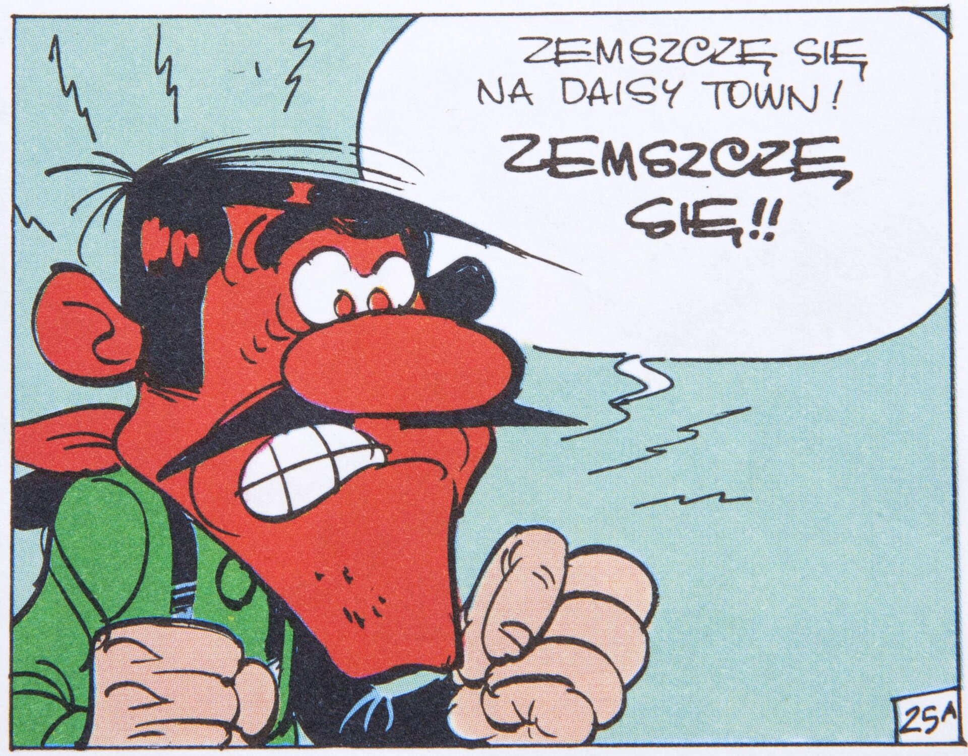 Ilustracja przedstawia fragment komiksu „ Lucky Luke  [czyt. laki luk].  Daisy Town [czyt. dejzi tałn]”. Ukazuje mężczyznę ubranego w zieloną koszulę z zaciśniętymi pięściami. Postać ze złości szczerzy białe zęby, jego twarz jest cała czerwona ze złości. Przy nim zamieszczony jest dymek ze słowami: Zemszczę się na  Daisy Town  [czyt. dejzi tałn]! Zemszczę się!!