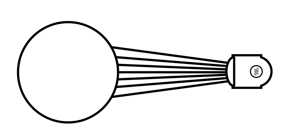 Ilustracja przedstawia przykład oświetlenia. Z małego reflektora rozchodzi się światło wąskim promieniem oświetlając znajdujący się przed nim duży przedmiot częściowo, tylko od frontu.
