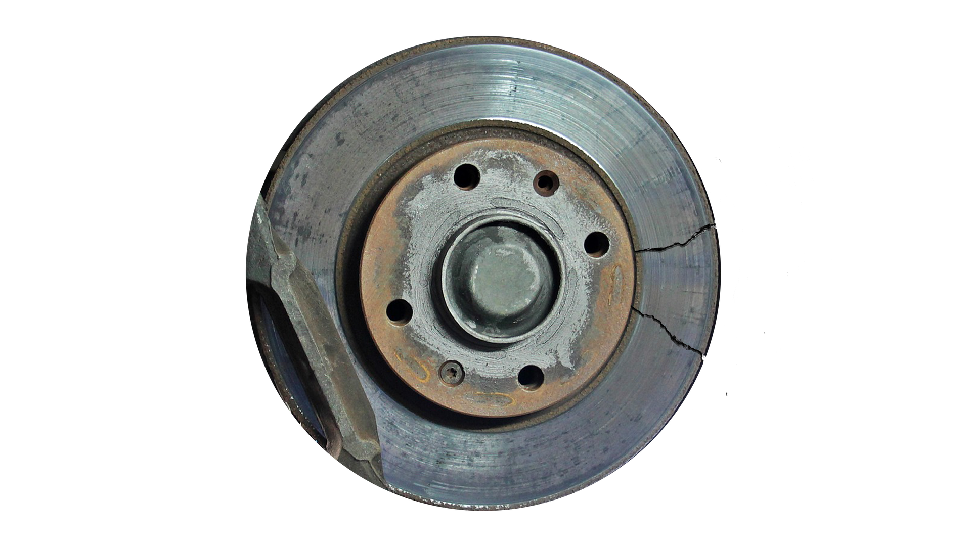 Ilustracja przedstawiająca pękniętą tarczę hamulcową.