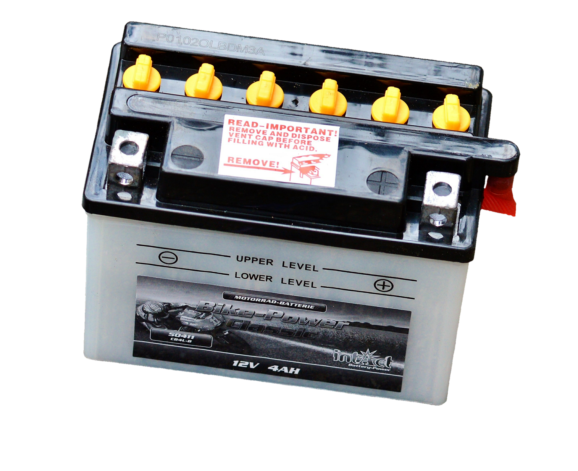 Zdjęcie przedstawia akumulator. Ma plastikową obudowę. W górnej części znajdują się w jednym rzędzie małe korki, które można odkręcać. Z przodu na obudowie jest znak minus po lewej stronie i plus po prawej stronie.