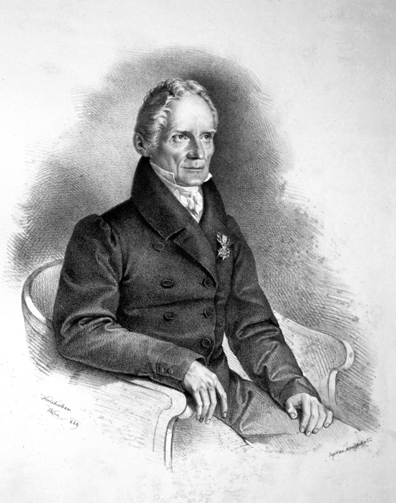 Grafika przedstawia portret Carla Friedricha Christiana Mohsa. Portret jest czarno—biały, wykonany najprawdopodobniej ołówkiem. Mężczyzna siedzi na fotelu ustawionym pod ukosem do obserwatora. Ma on krótkie, siwe, delikatnie kręcące się włosy, wysokie czoło i duży, prosty nos. Ubrany jest w białą koszulę i zapiętą, czarną marynarkę, do której przypięty jest order.