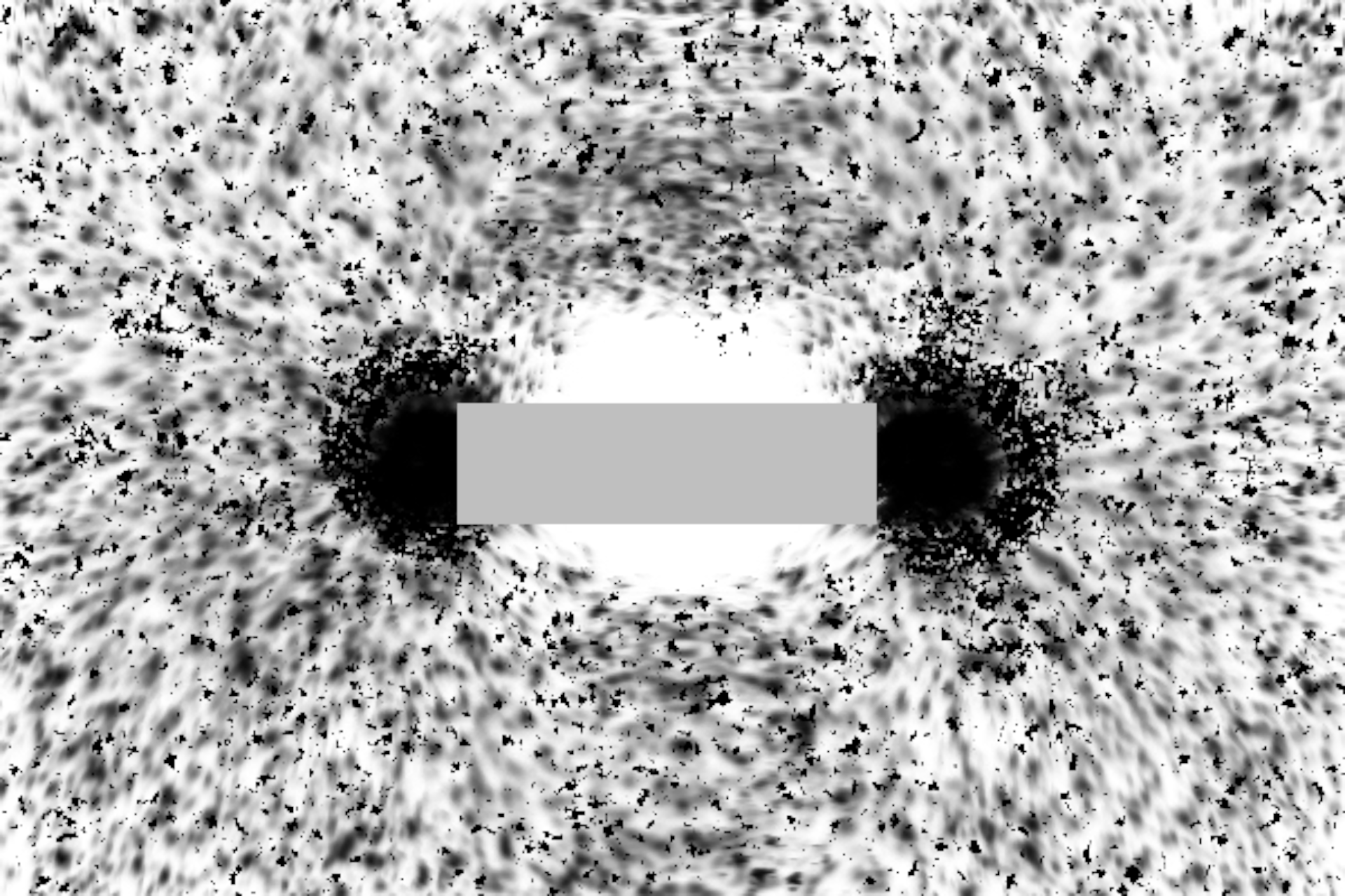 Rys. a. Ilustracja przedstawia negatyw zdjęcia, na którym zaprezentowano sposób układania się opiłków żelaza zanurzonych w cieczy wokół magnesu sztabkowego. W centralnej części ilustracji widoczny jest magnes sztabkowy w postaci szarego poziomego prostokąta. Opiłki żelaza widoczne w postaci ciemnych drobinek układają się wokół magnesu, tworząc linie odpowiadające liniom pola magnetycznego. Biegną one pomiędzy pionowymi krawędziami magnesu tworząc owalne krzywe zamknięte. Krzywe te biegną dookoła dłuższych, poziomych krawędzi magnesu sztabkowego. Największa koncentracja opiłków żelaza obserwowana jest w pobliżu prawej i lewej krawędzi magnesu.