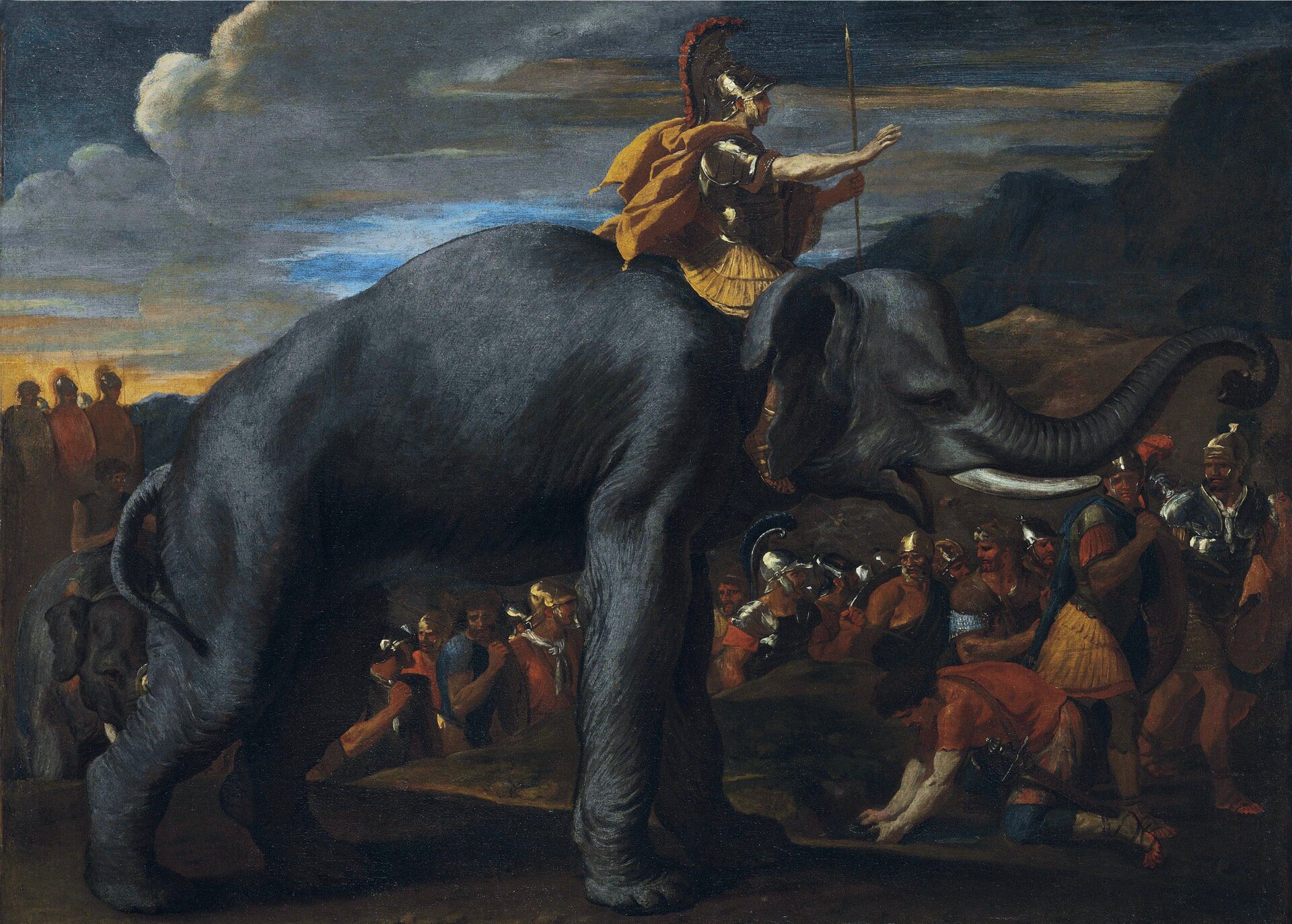 Kolorowy obraz przedstawiający żołnierzy idących do bitwy. Na pierwszym planie żołnierz w złotym hełmie z pióropuszem, z włócznią w dłoni jedzie na szarym słoniu.