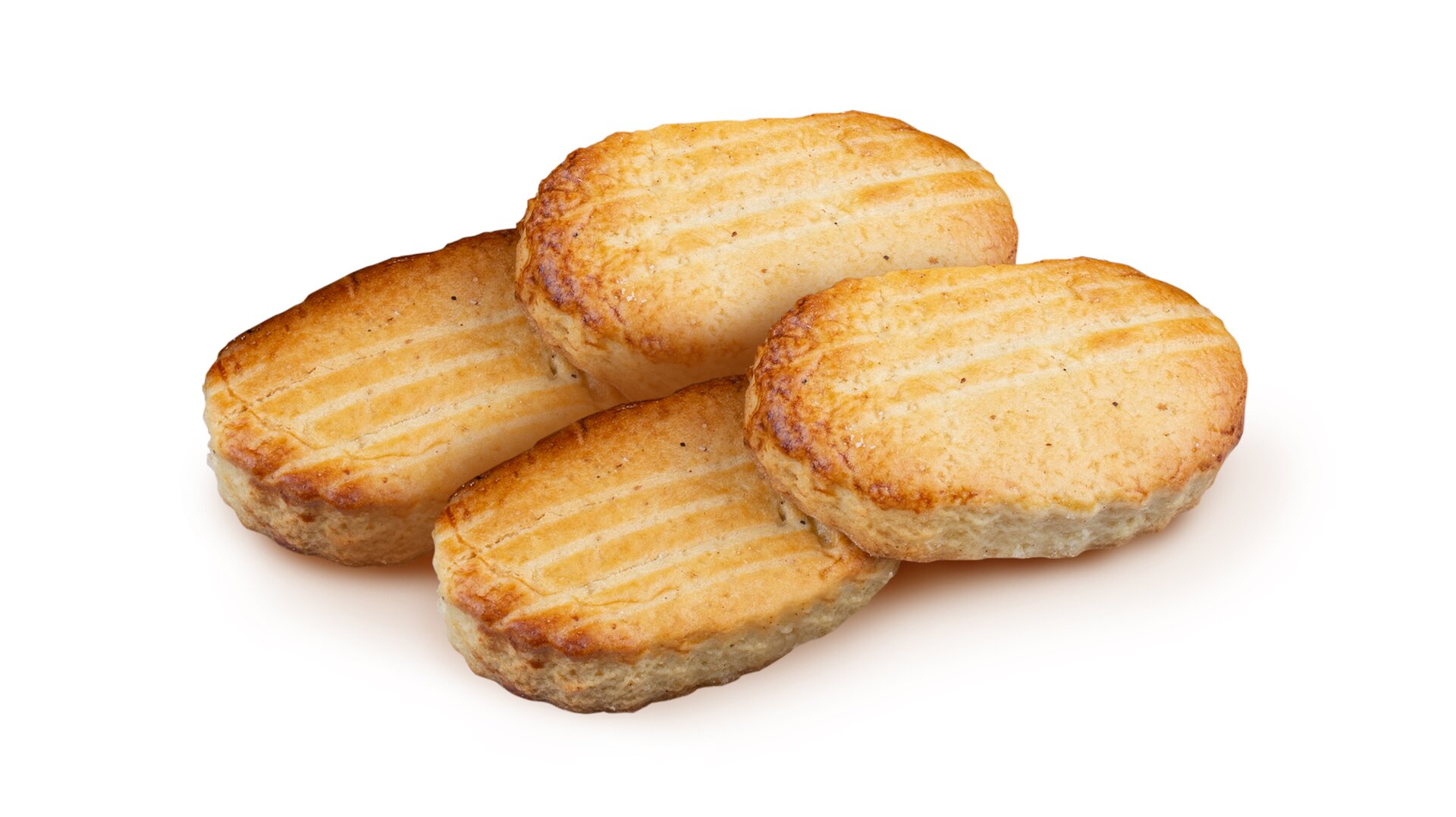 Owalne ciasteczka koloru złocistego.