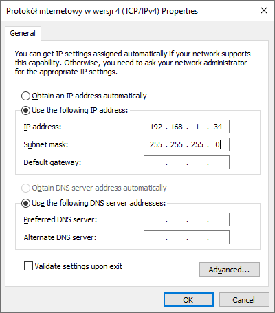 Ustawienie adresu IPv4 w systemie Windows. Okno dialogowe posiada opcje Obtain an IP address automatically lub Use the following IP address, wybrano drugą opcję, zatem możliwe było wpisanie 3 adresów: IP address, Subnet mask oraz Default gateway. Wpisane adresy to 192.168.1.24 oraz 255.255.255.0 . Kolejnymi obcjami są Obtain DNS server address automatically oraz oznaczony Use the following DNS server addresses. Pola poniżej są puste Preferred DNS server oraz Alternate DNS server.