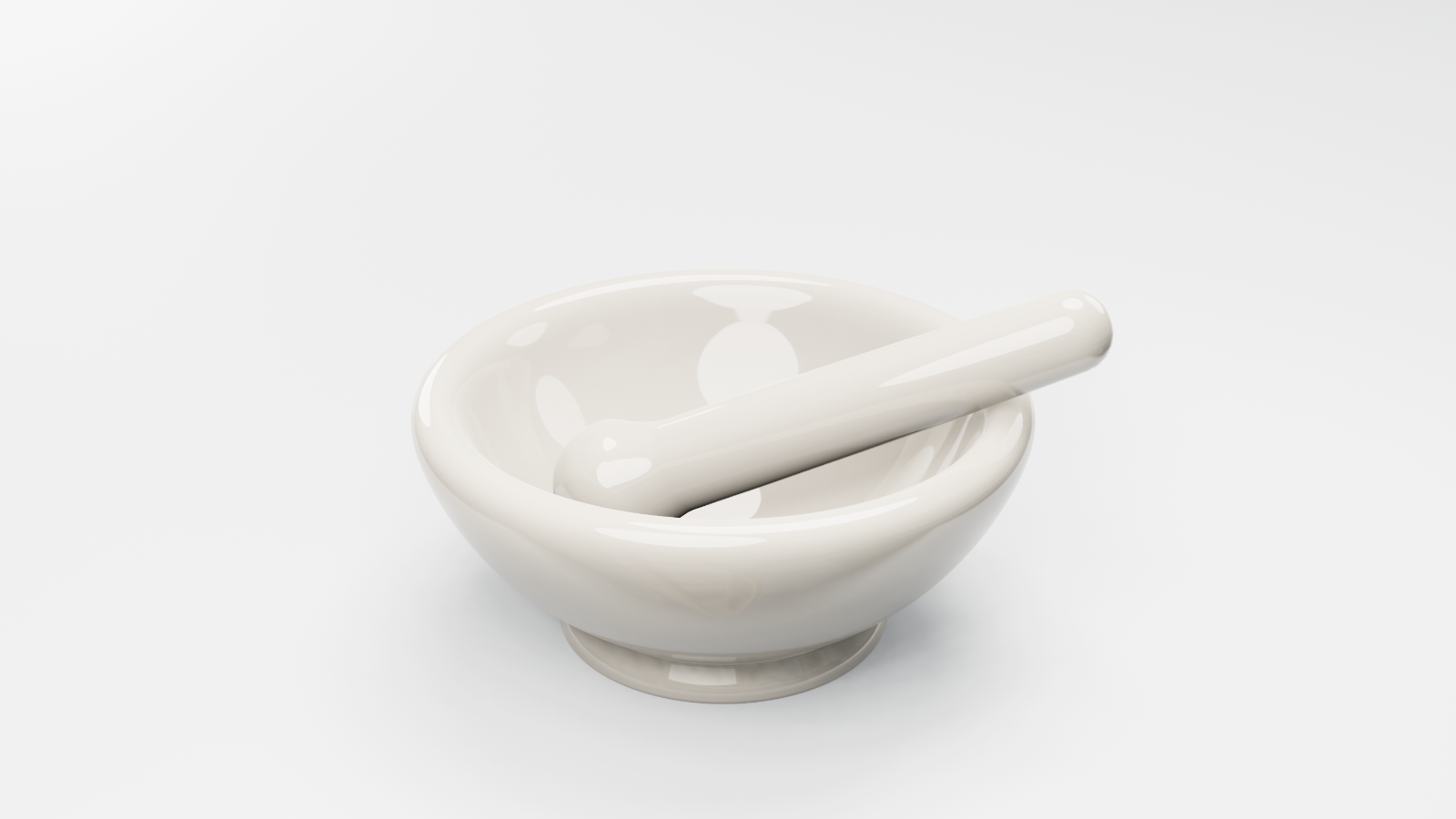 Zdjęcie przedstawia porcelanowy moździerz: misę w komplecie z tłuczkiem.