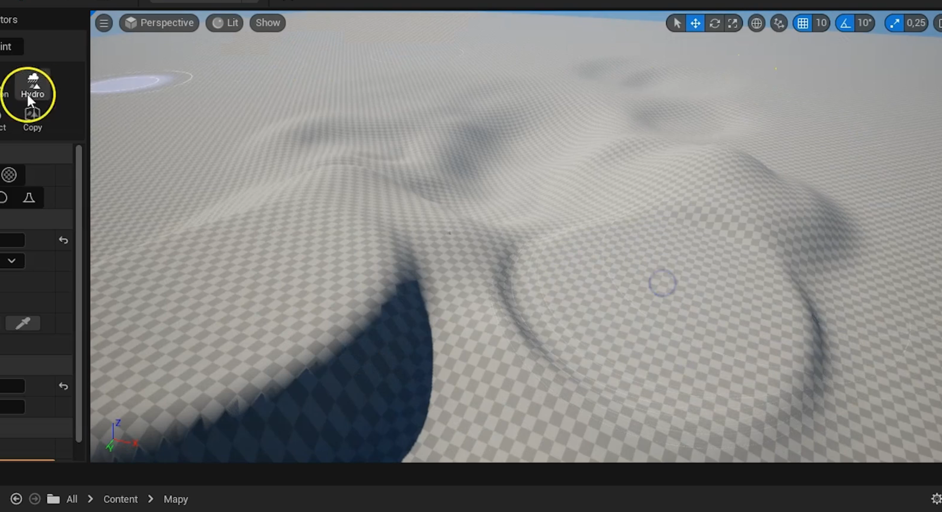 Ilustracja przedstawia zrzut ekranu - panel programu Unreal Engine . Widoczny jest ekran z rozległą płaszczyzną w kratkę w dwóch odcieniach koloru szarego, która na horyzoncie łączy się z niebem. Płaszczyzna ta posiada liczne wgłębienia i wybrzuszenia. Pośrodku jednego z wgłębień znajduje się szary okrąg. Na górze ilustracji widać ułożone w rzędzie symbole graficzne.