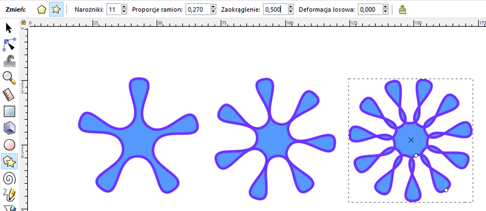 Zrzut ekranu przedstawia trzy kształty przypominające płatki śniegu stworzone w programie Inkscapie. Pierwszy z nich ma pięć ramion, drugi siedem, a trzeci jedenaście. Na zrzucie ekranu zaznaczony został trzeci kształt. W panelu górnym programu zaznaczony jest przycisk z gwiazdą, wartość narożników jest równa jedenaście, proporcje ramion wynoszą dwadzieścia siedem setnych, a wartość zaokrąglenia jest równa pięć dziesiątych. Wartość  deformacji losowej jest równa zero. W panelu bocznym znajdującym się po lewej stronie wybrany został przycisk przedstawiający gwiazdę nałożoną na pięciokąt.