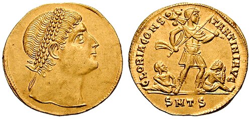  Zdjęcie przedstawia awers i rewers rzymskiej monety. Awers przedstawia porter mężczyzny z wieńcem laurowym na głowie. Rewers to sylwetka mężczyzny stojącego w pozycji bojowej z szablą w dłoni, pod jego nogami dwóch pokonanych. 