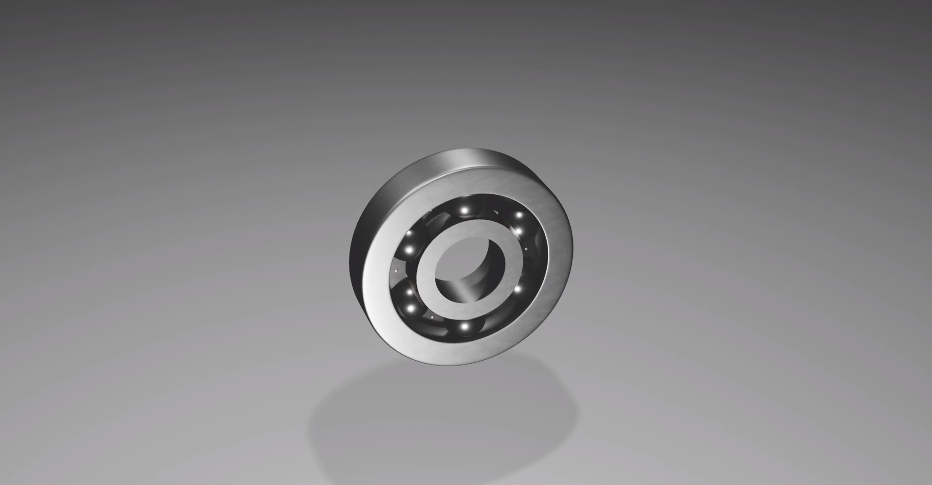 Ilustracja przedstawia okrągłe łożysko, wypełnione kulkami.