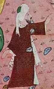 Ilustracja przedstawia mężczyznę w czerwonej szacie i białym turbanie. Ma on długą ciemną brodę i wyciąga ręce przed siebie.