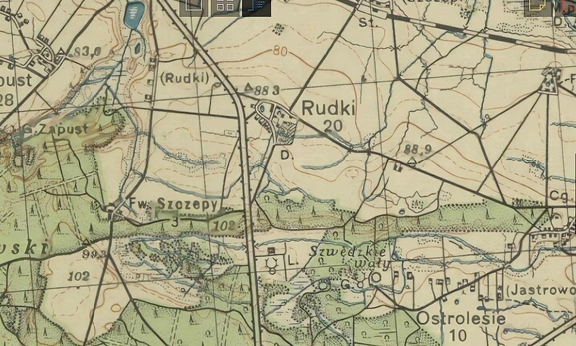 Zdjęcie przedstawia fragment mapy topograficznej z lat 30. XX wieku, na którym znajduje się teren wokół miejscowości Szamotuły, na której zaznaczono także miejscowość Rudki (w centralnej części mapy). Na planie są widoczne także: Ostroróg, Wielonek, Zapust, Szczepankowo, Klutschewo, Wygoda, Karolin, Gaj Wielki, Szczuczyn, Smilowo, Galowo, Jastrowo, Ostrolesie.