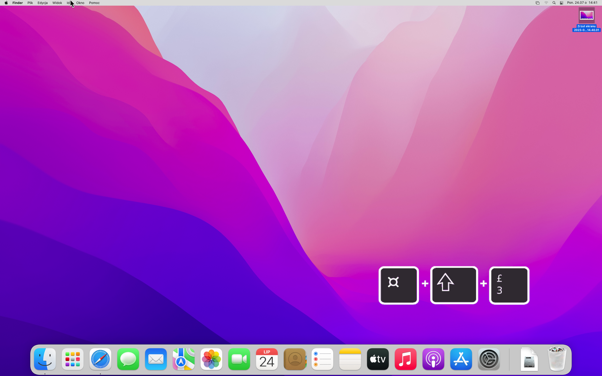 Ilustracja przedstawia pulpit systemu MacOS w wersji 13 Ventura. Tapeta przedstawia falista kolory. Na pulpicie umieszczono grafikę przedstawiającą kombinację klawiszy Command, Shift oraz trzy.