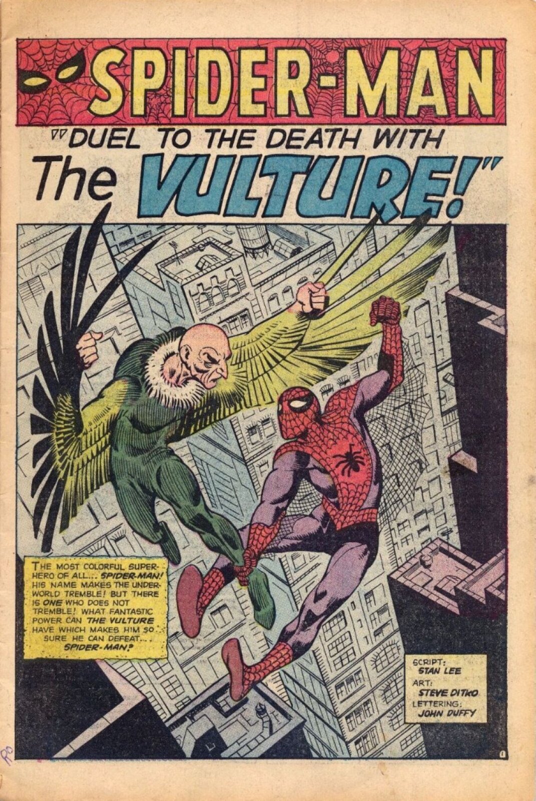 Na ilustracji w górnej części znajduje się tytuł komiksu w języku angielskim - Spider‑man „Duel to the death with the Volture!” W środkowej części ilustracji po prawej stronie znajduje się spider‑man ubrany w czerwony strój z pająkiem znajdującym się na piersi. Po lewej stronie ilustracji znajduje się człowiek w stroju ptaka. Mężczyzna ma na sobie zielony strój a do jego rąk przytwierdzone dwa zielone skrzydła. W dolnej części ilustracji znajduje się tekst w języku angielskim: The most colorful superhero of all…Spider‑man! his name makes the underworld tramble! but there is one who does not tremble! What fantastic power can’t the volture have which makes his so sure he can defeat... Spider‑man! W tle ilustracji znajdują się szare budynki.
