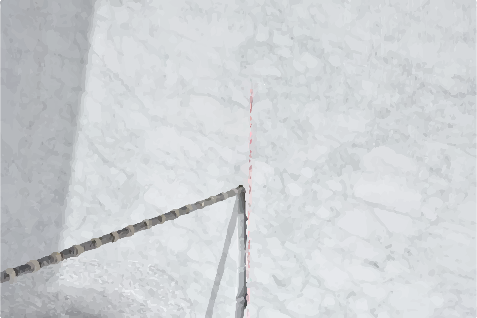 Grafika przedstawia cięcie bloku kamiennego za pomocą liny diamentowej. W miejscu cięcia przechodzi lina.