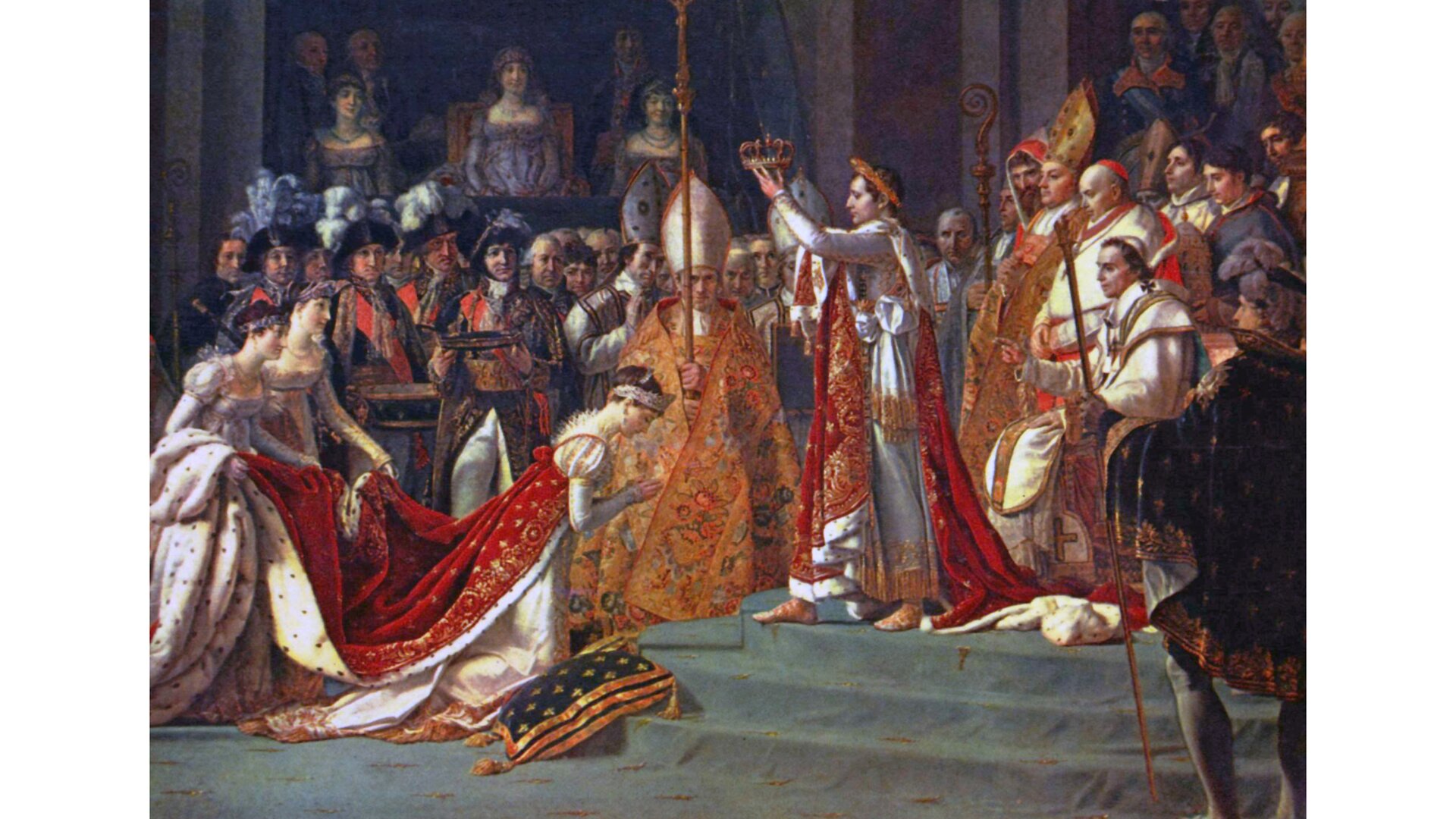 Obraz „Koronacja Napoleona”: Napoleon trzyma w górze koronę dla Jadwigi. Kobieta klęczy, ma pochyloną głowę i złożone ręce.