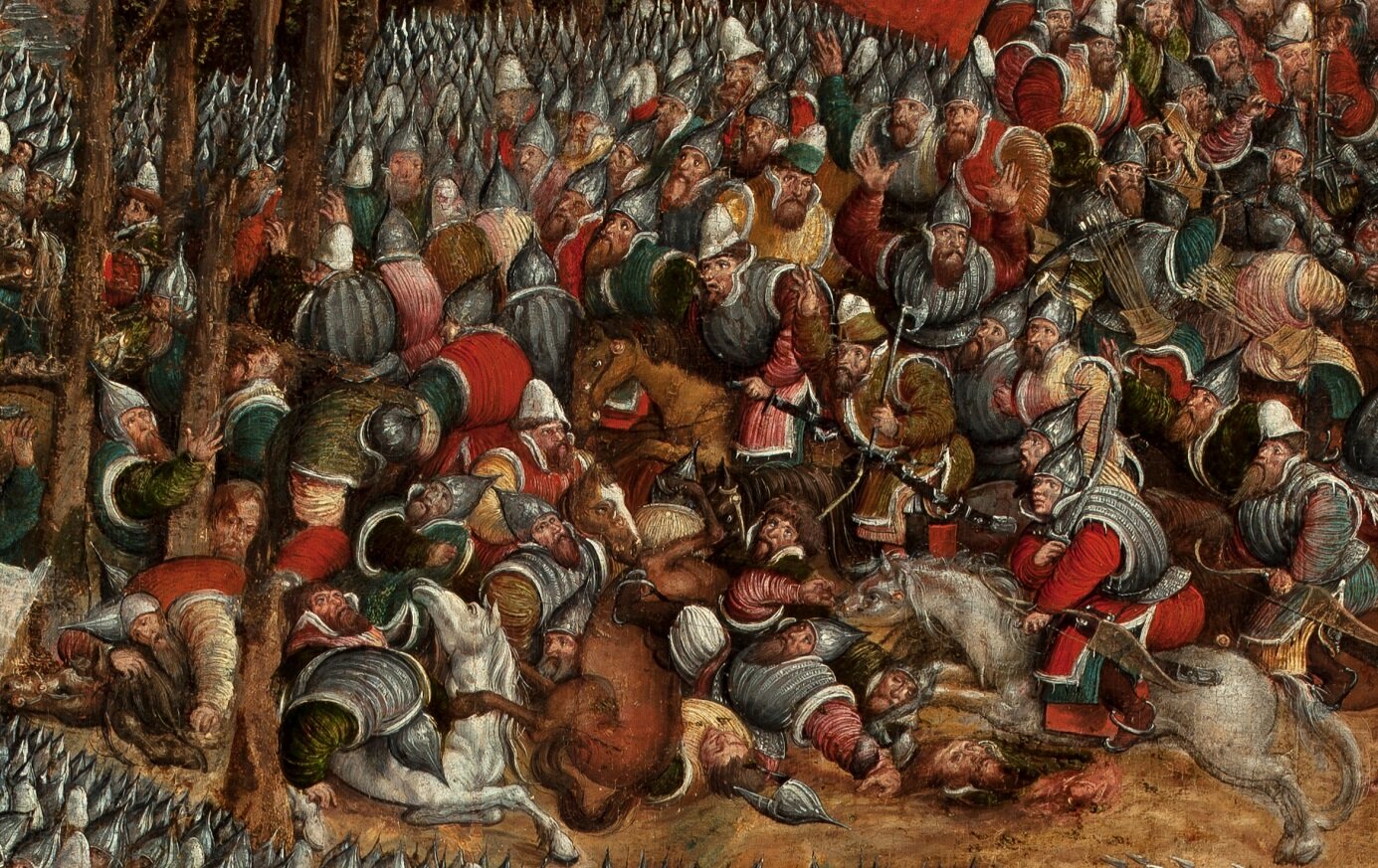 Kliknij, aby powiększyć Obraz przedstawia poległych żołnierzy i konie. Żołnierze mają spiczaste, srebrne hełmy i ubrani są w srebrne zbroje, częściowo przysłonięte kolorowymi płaszczami. Z prawej strony biegną kolejni wojskowi, na górze i lewym dole ilustracji widać morze hełmów.