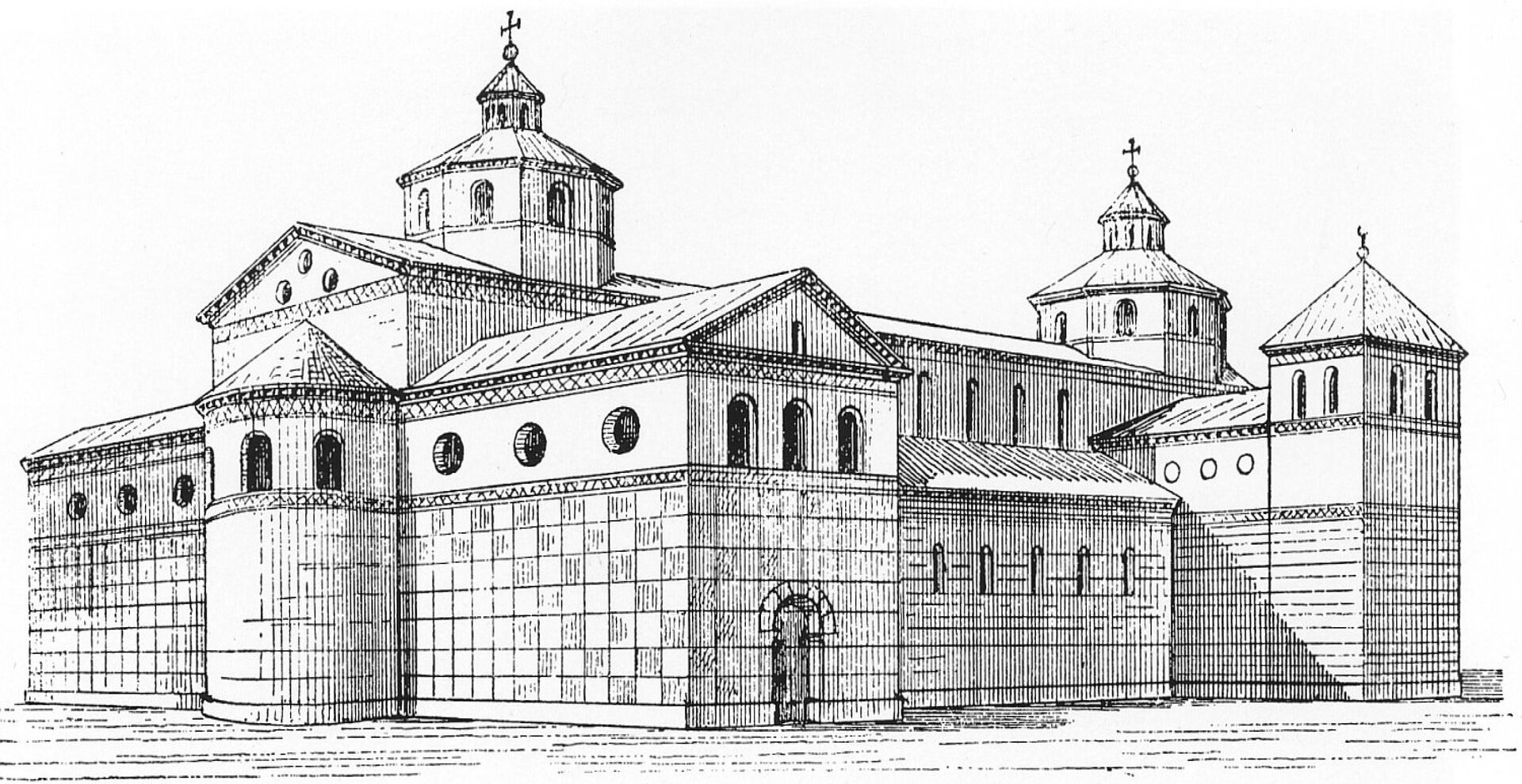 Rycina przedstawia rekonstrukcję zewnętrznego wyglądu katedry w Kolonii z czasów karolińskich. W centrum na pierwszym planie widoczne wejście do transeptu. Po lewej stronie zarysowana absyda. Po prawej ciąg nawy głównej i bocznej. Całość konstrukcji przykryta dachem, nad nim dwie wielokątne wieże z krzyżami na szczycie. Do nawy bocznej dobudowana konstrukcja prostopadłościennej wieży. Niewielkie otwory okienne w kształcie łuków pełnych i owalne na całej długości prezentowanego szkicu. 