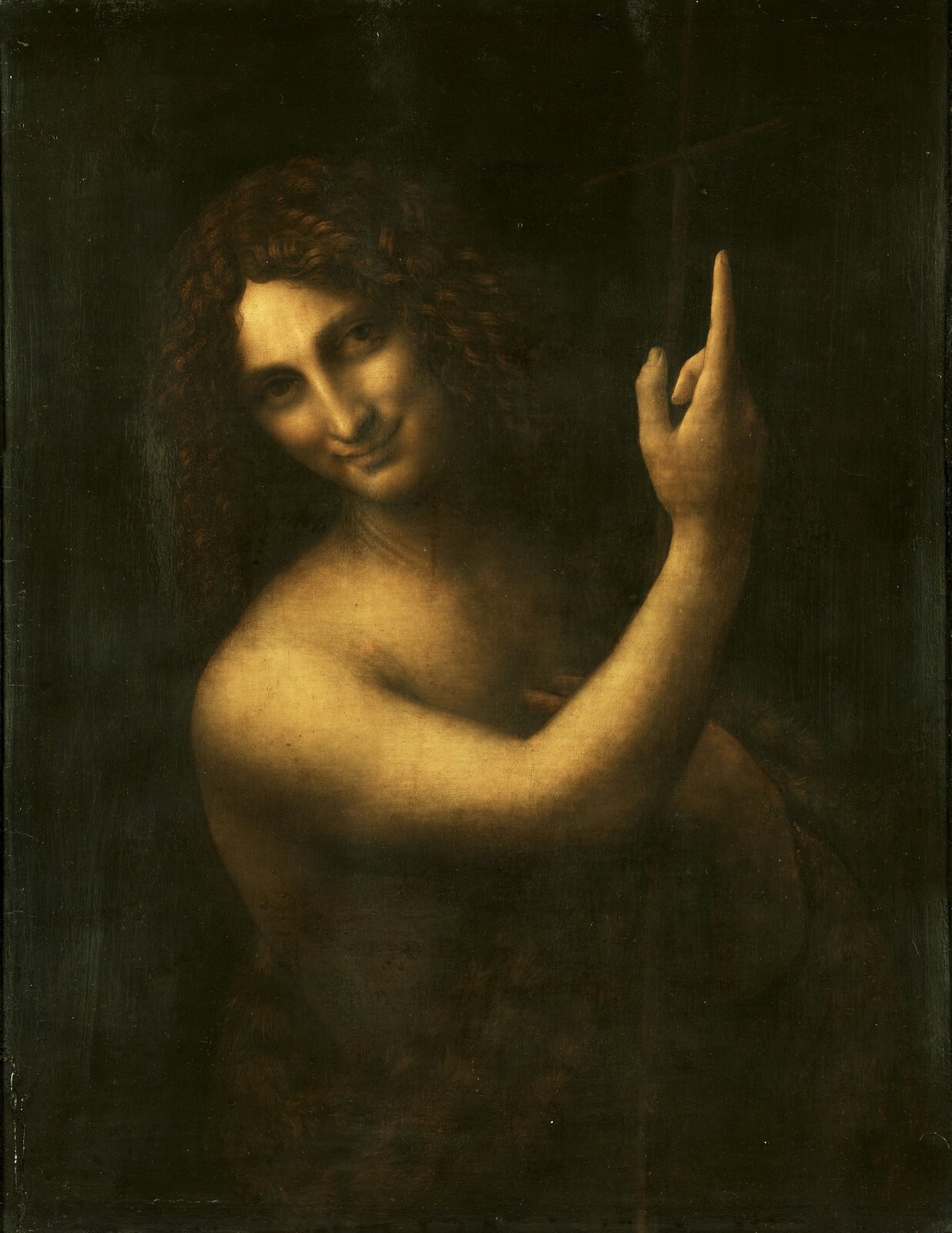 Ilustracja przedstawia obraz Leonarda da Vinci „Jan Chrzciciel”. Ma kształt pionowego prostokąta i ukazuje postać świętego, jako młodzieńca o długich kręconych włosach z lekko przechyloną na prawą stronę głową i zgięta ręką, wzniesioną ku górze i wskazującego palcem ku niebu. Na jego twarzy pojawia się delikatny uśmiech. Postać przedstawiona jest na jednolitym, ciemnym tle. 