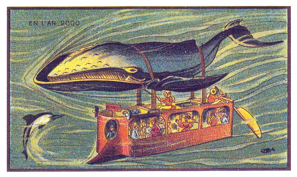 Grafika przedstawia pojazd w rodzaju okrętu podwodnego, który przymocowany jest do wieloryba.