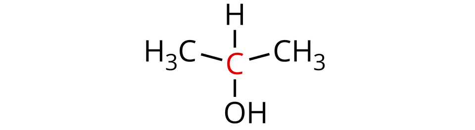 Ilustracja przedstawiająca wzór cząsteczki propan-dwa-olu. Atom węgla zaznaczony na czerwono łączy się z atomem wodoru, grupą hydroksylową O H oraz dwiema grupami metylowymi C H indeks dolny, trzy, koniec indeksu dolnego.  