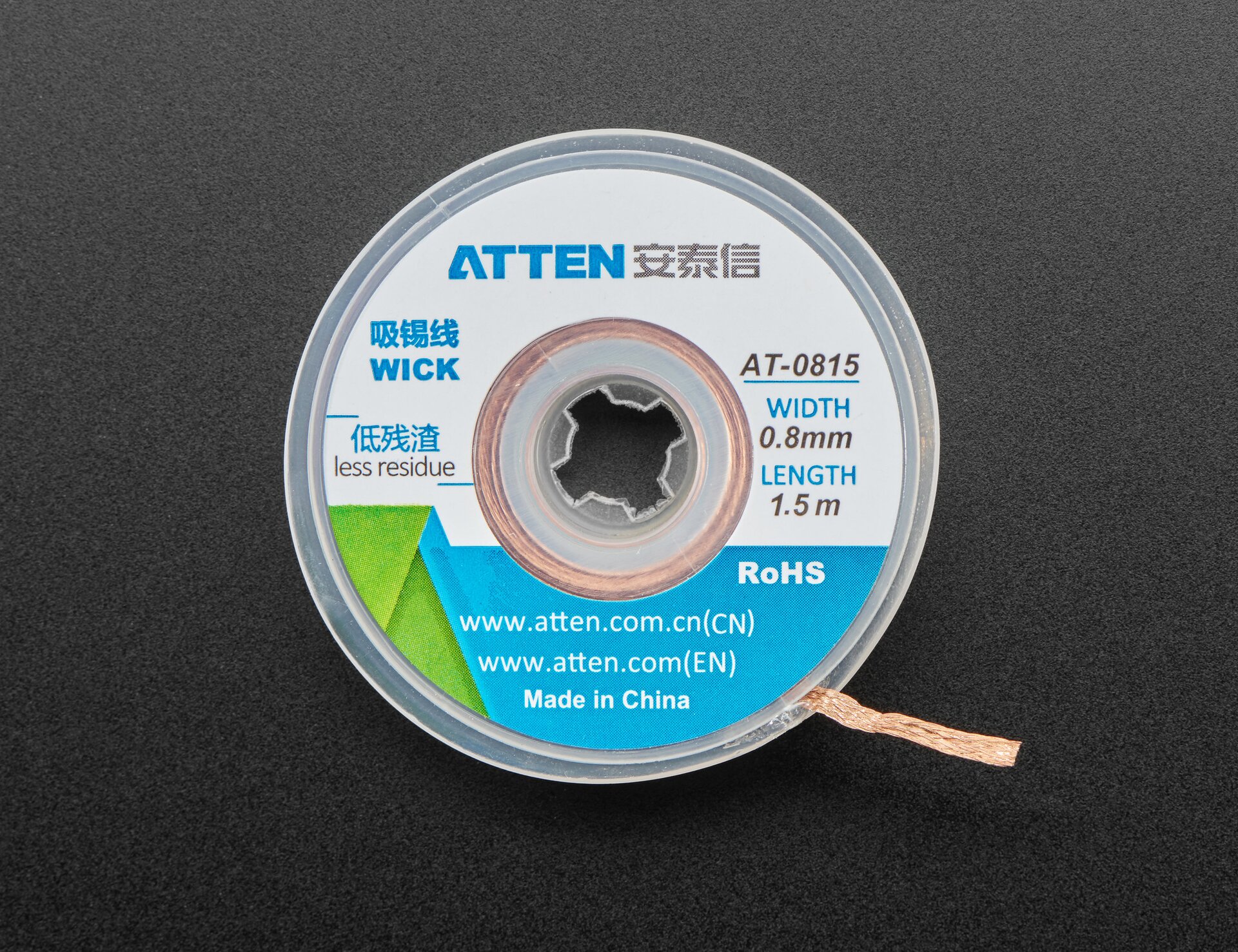 Zdjecie przedstawia plecionkę która nawinięta jest na szpulę. Jest to tasiemka z przeplecionej miedzi.