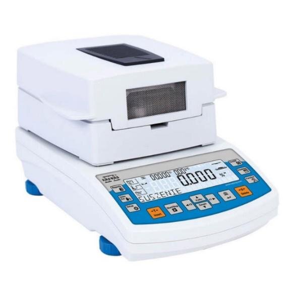 Zdjęcie przedstawia wagosuszarkę. Urządzenie składa się z elementu, na którym umieszcza się próbkę oraz przedniej części z wyświetlaczem i przyciskami funkcyjnymi.