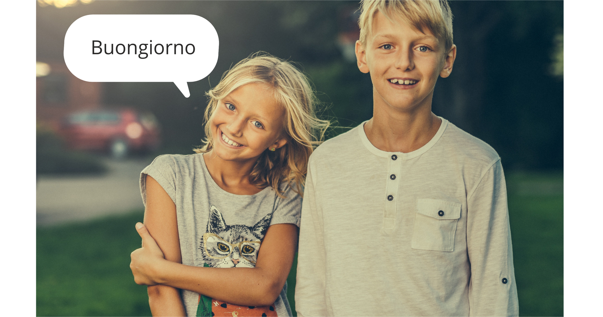 Grafika z komiksu przedstawia dwoje nastolatków: chłopak i dziewczyna. Dymek przy dziewczynce z napisem: Buongiorno.