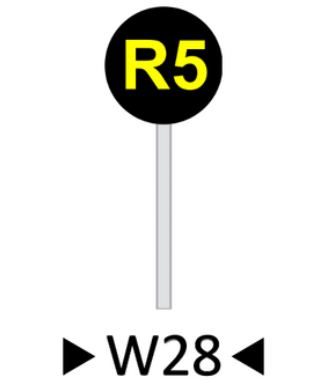 Wskaźnik wu dwadzieścia osiem. Okrągła czarna tablica na której znajduje się żółty napis er pięć.