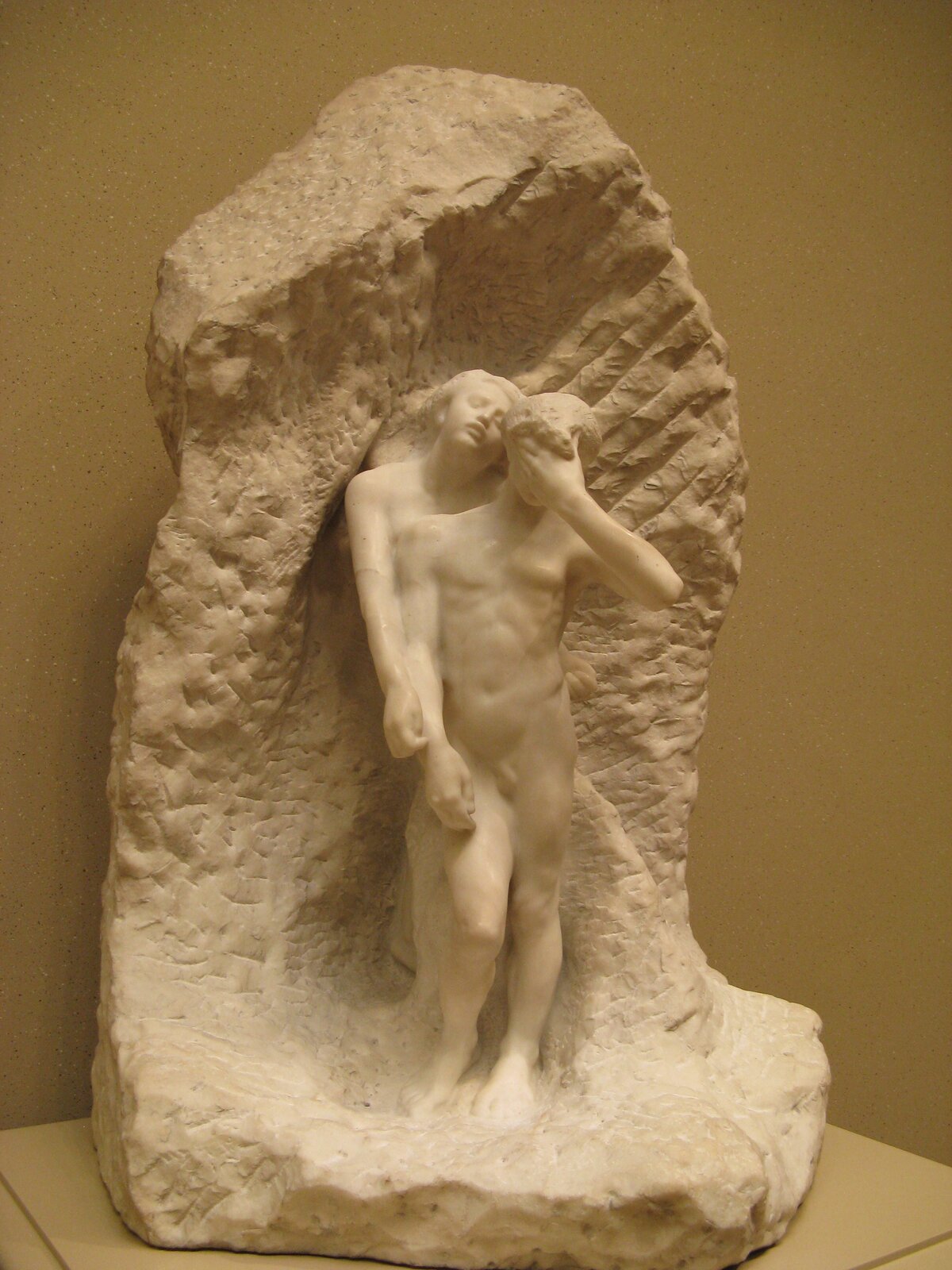 Na ilustracji jest przestawiona marmurowa rzeźba Auguste Rodin’a pt. „Orfeusz i Eurydyka”. Ukazuje ona postać nagiego mężczyzny, który lewą ręką zasłania sobie oczy. Za nim, przytulona do jego pleców, stoi kobieta. Ma odchyloną do tyłu głowę, przymknięte powieki. Postaci ustawione są na skale, która stanowi tło rzeźby.