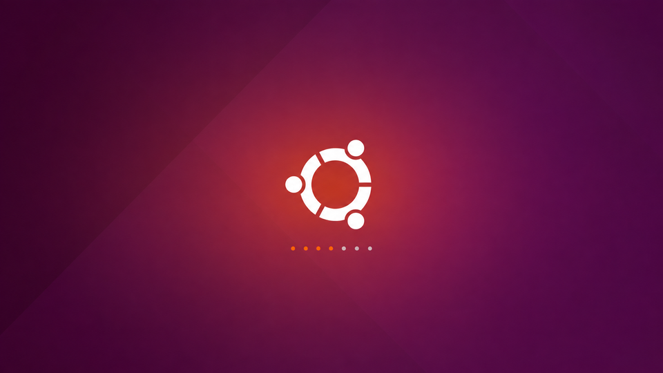 Na zdjęciu pokazano ekran powitalny dla systemy: Ubuntu. W centralnej części ekrany na czerwonym tle znajduje się symbol w kształcie białego okręgu z wpisanym w środku okręgiem zbudowanym z trzech identycznych niepołączonych ze sobą łuków. Nad każdym z łuków w połowie jego długości znajduje się kropka.Pod napisem narysowanych jest pięć równomiernie rozmieszczonych kropek. 